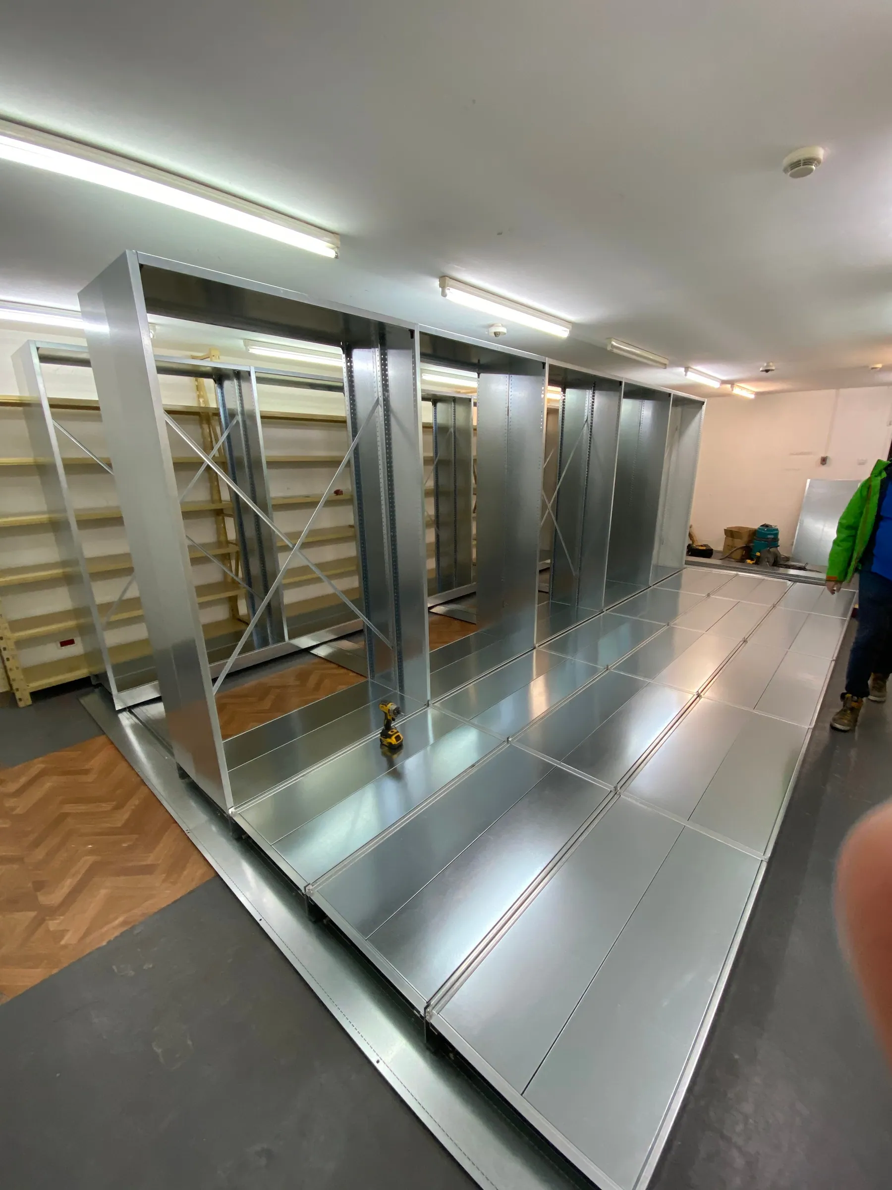 The installed mobile shelving, lined up along the archive